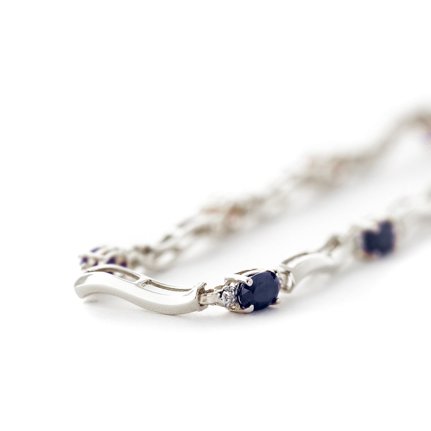 Rhythmic Flow Diamond And Sapphire Bracelet