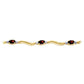 Rhythmic Flow Garnet and Diamond bracelet